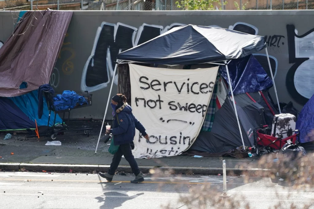 services not sweeps tent in seattle, virtue hoarders